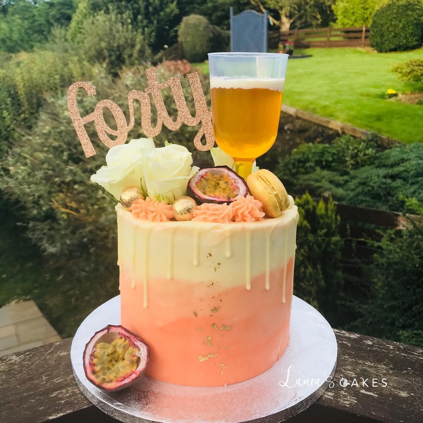 Celebration cake: A glass of beer and a fruit on top