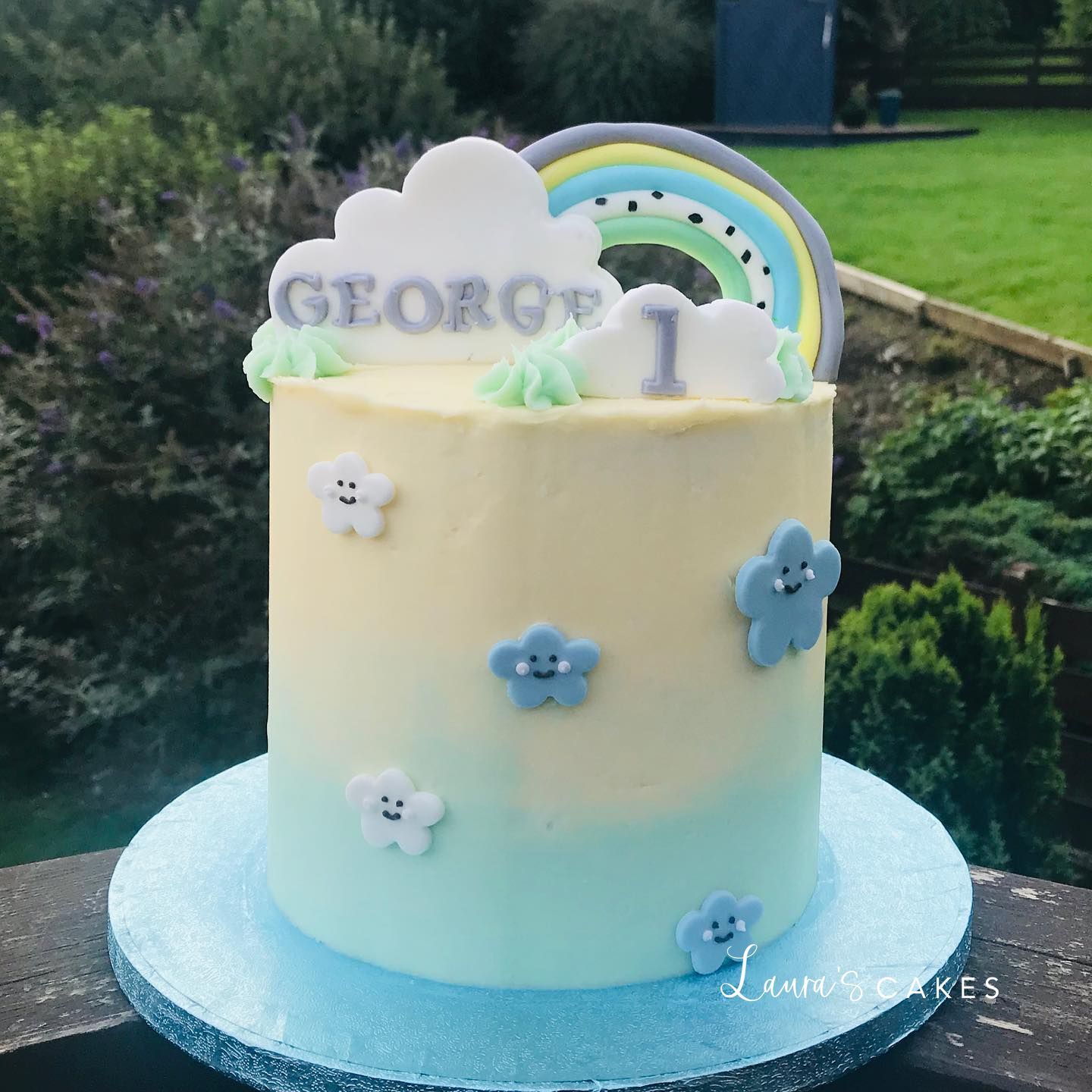 Celebration cake: A rainbow theme on it