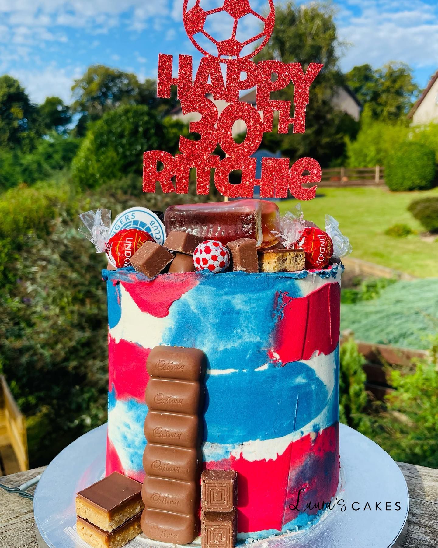 Celebration cake: A red, white and blue cake with a red, white and blue top