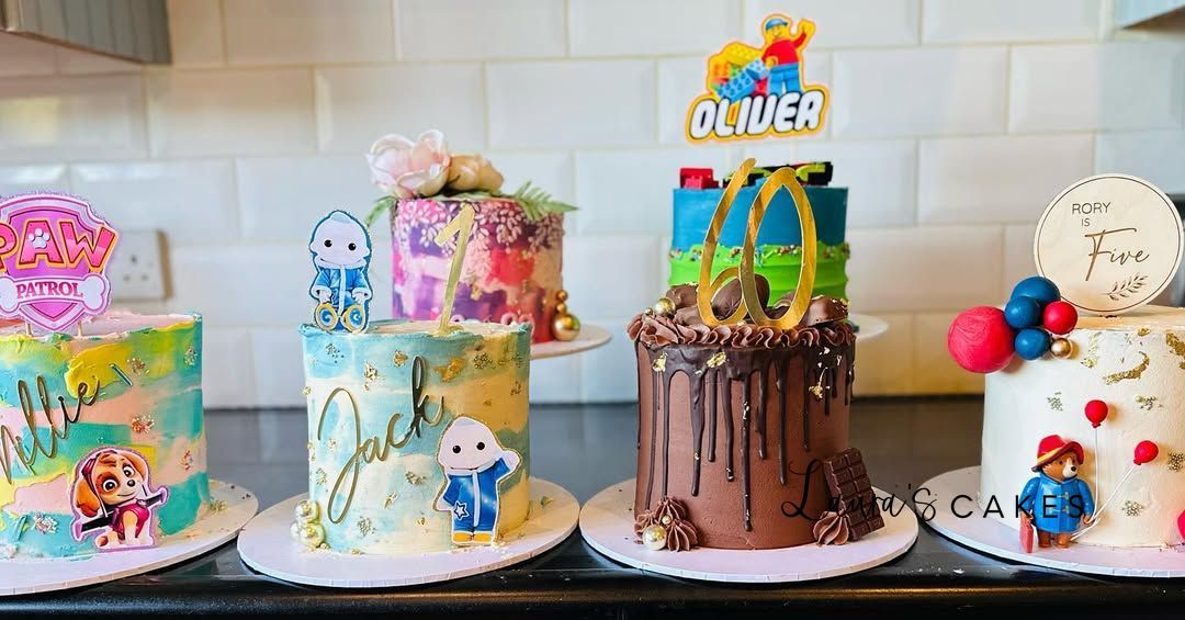 Celebration cake: A row of cakes with different designs on them