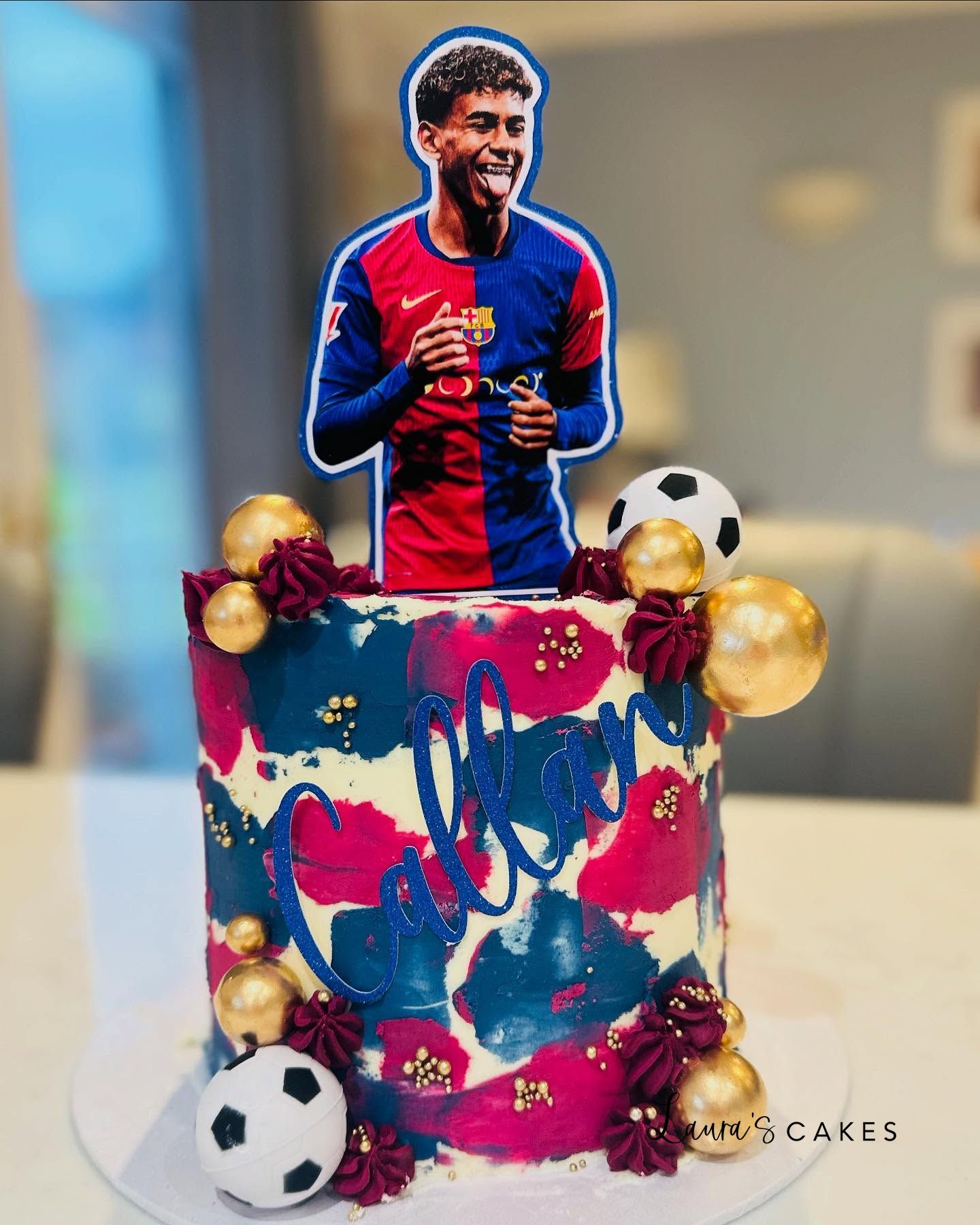 Celebration cake: A soccer player on top