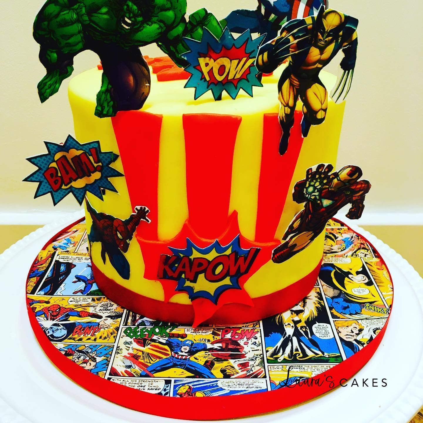Celebration cake: A superhero theme on it