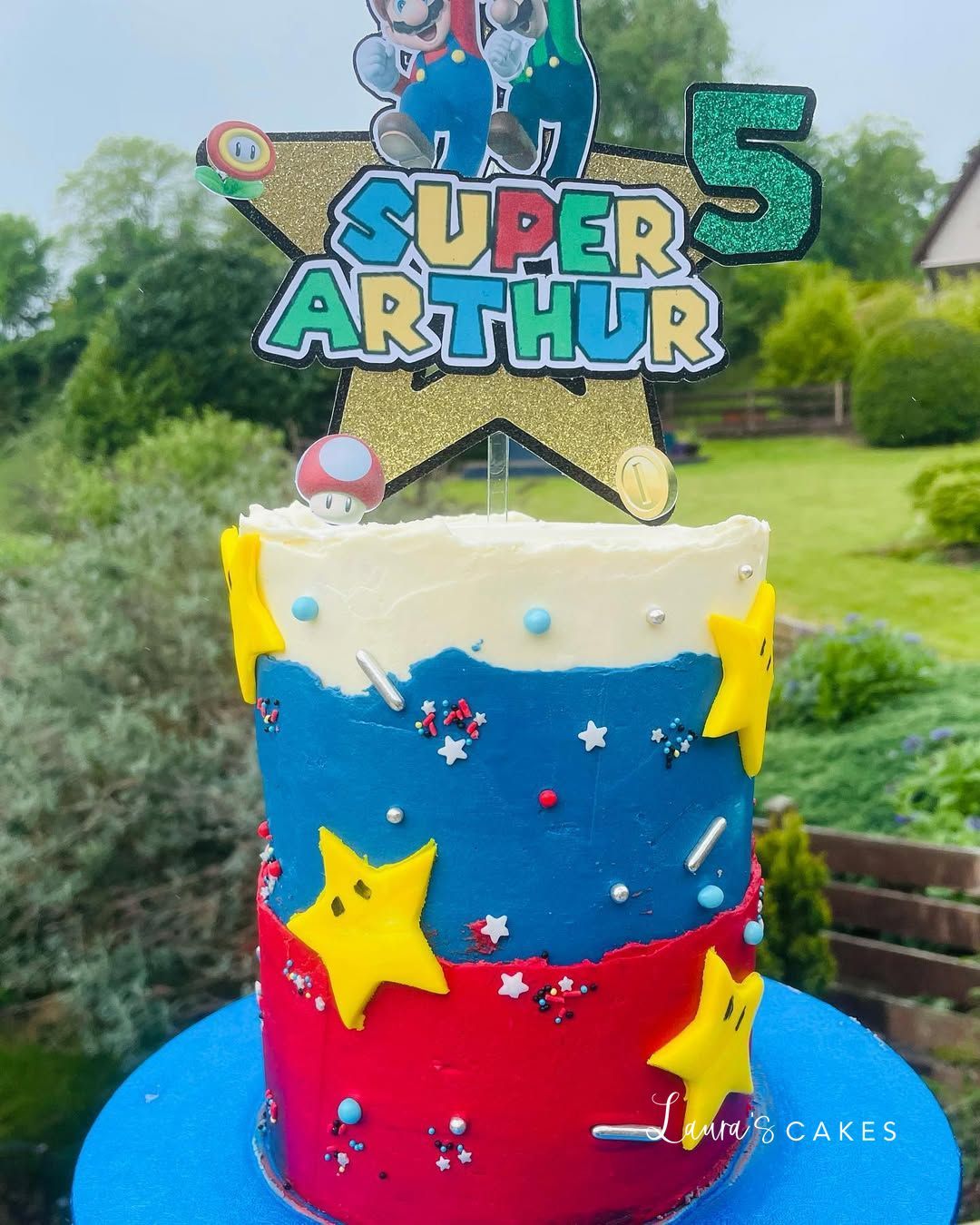 Celebration cake: A superhero theme on top
