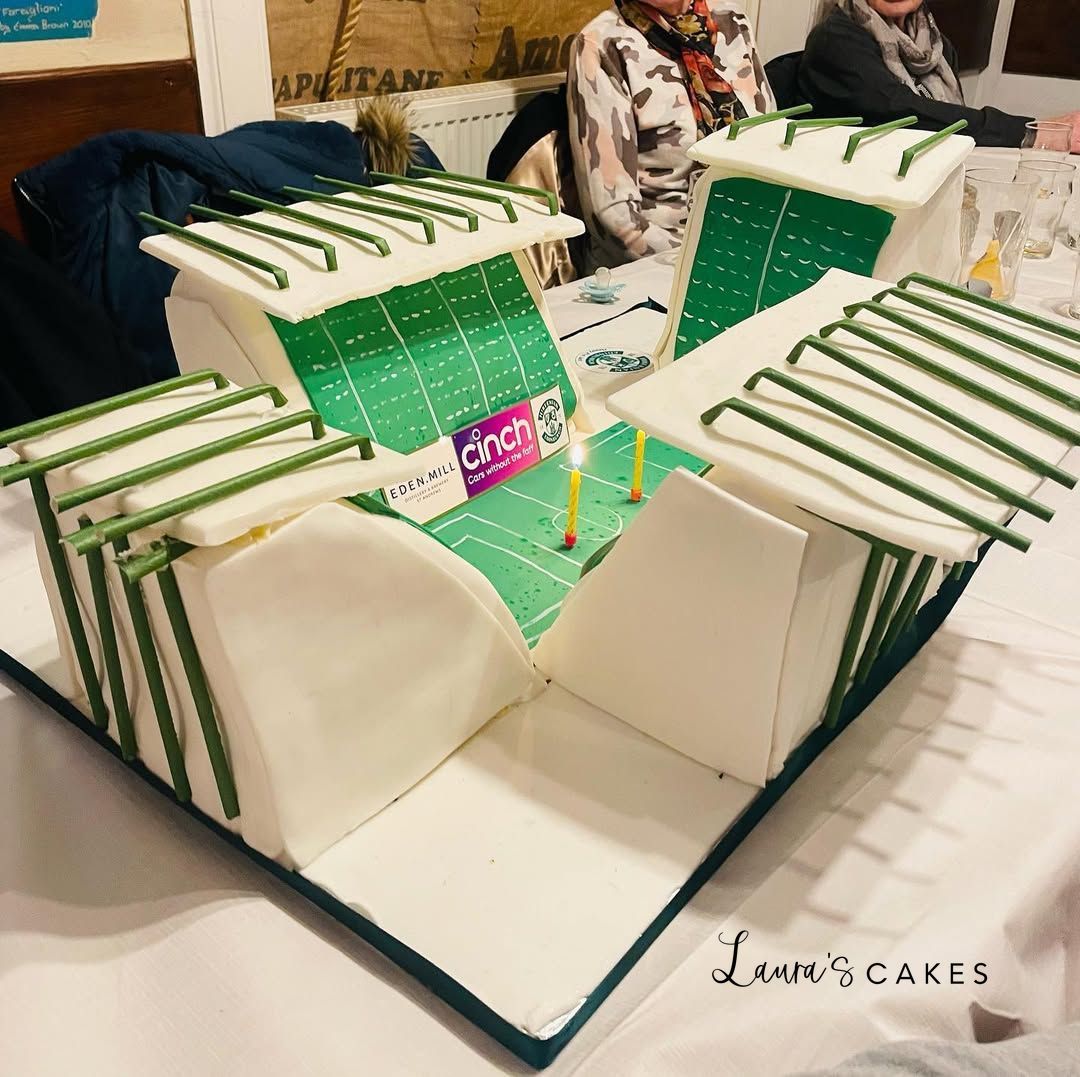 Celebration cake: A table with a football field and a football field