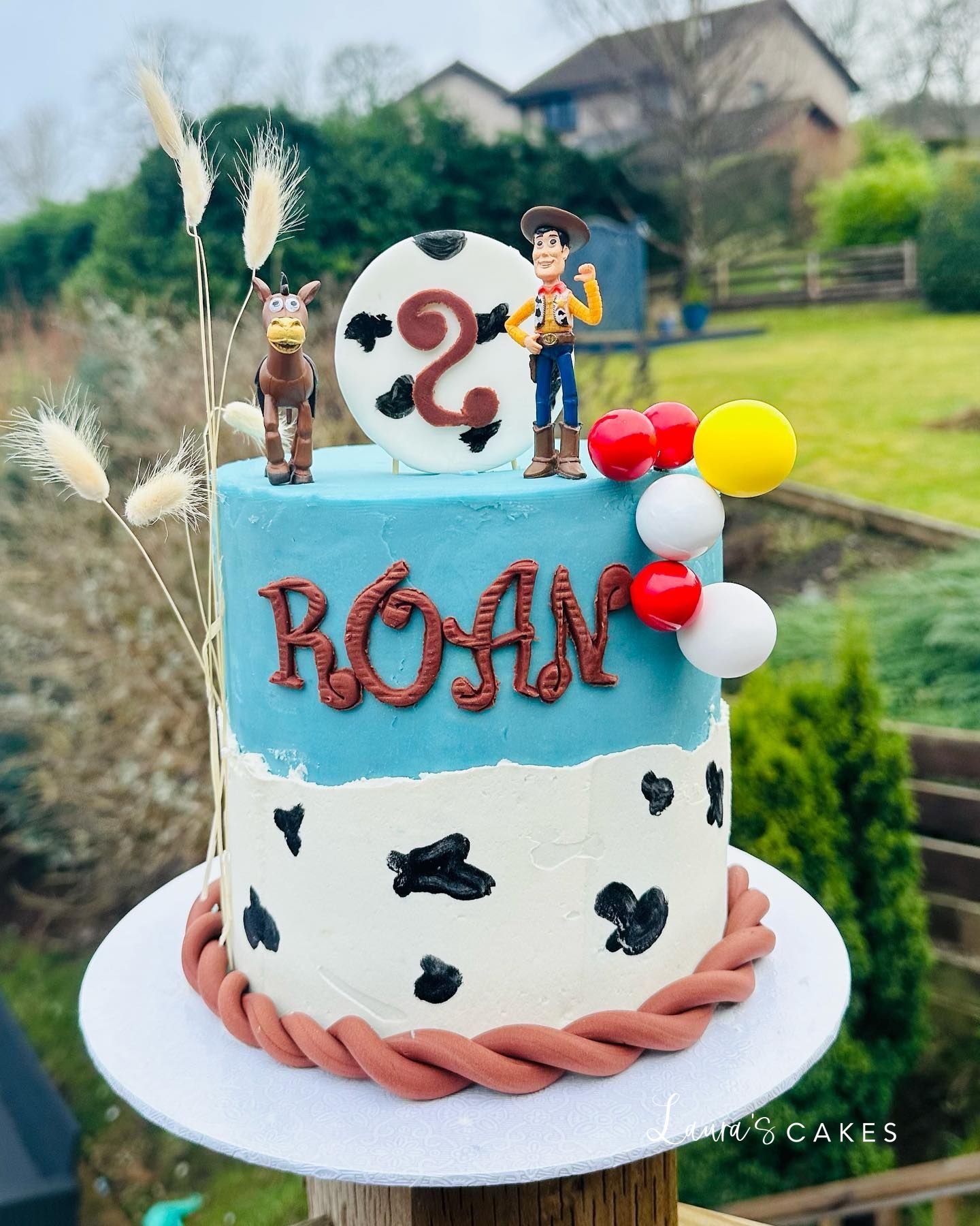 Celebration cake: A toy on top of it