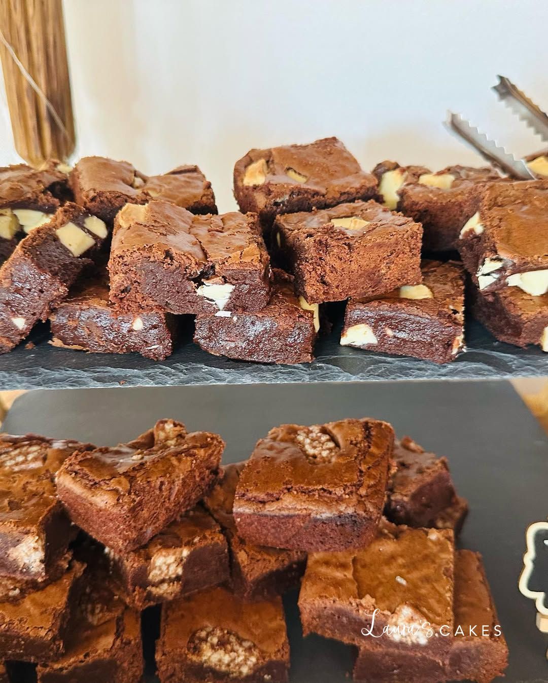 Celebration cake: A tray of brownies with nuts and chocolate