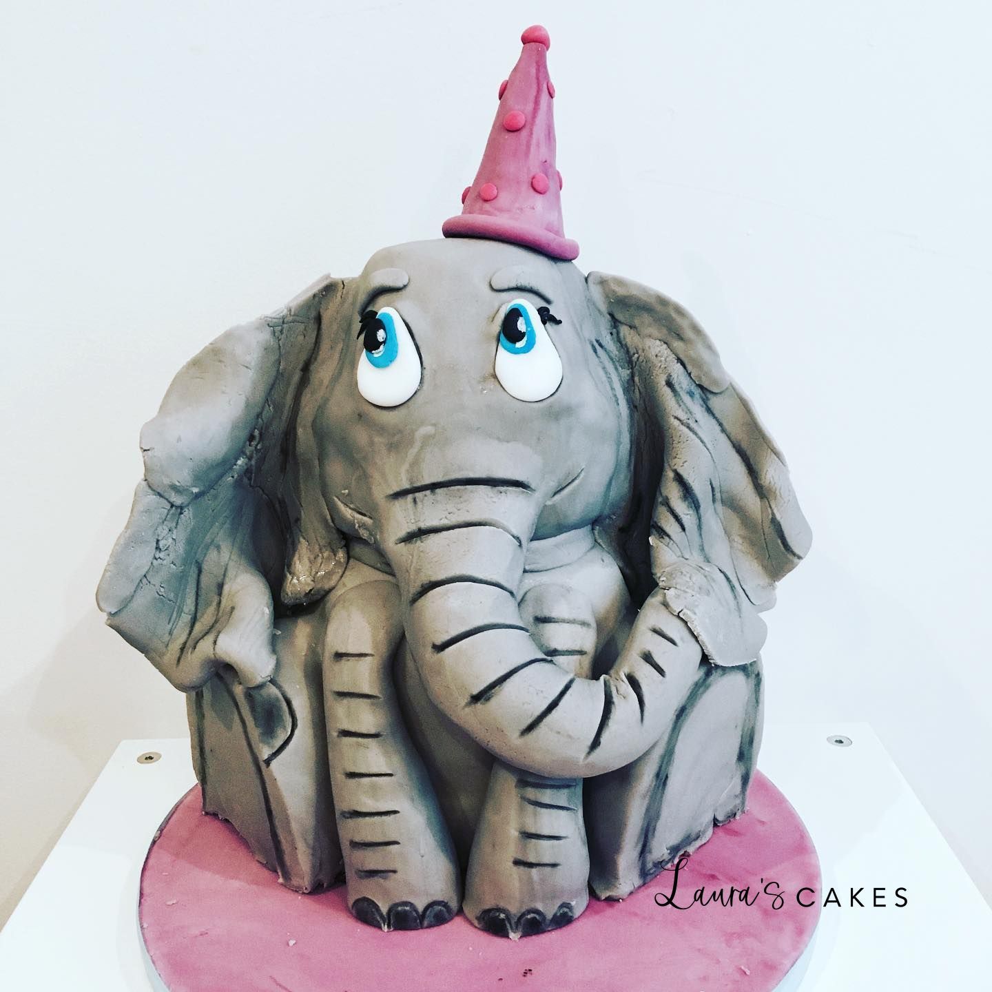 Celebration cake: An elephant on top of it