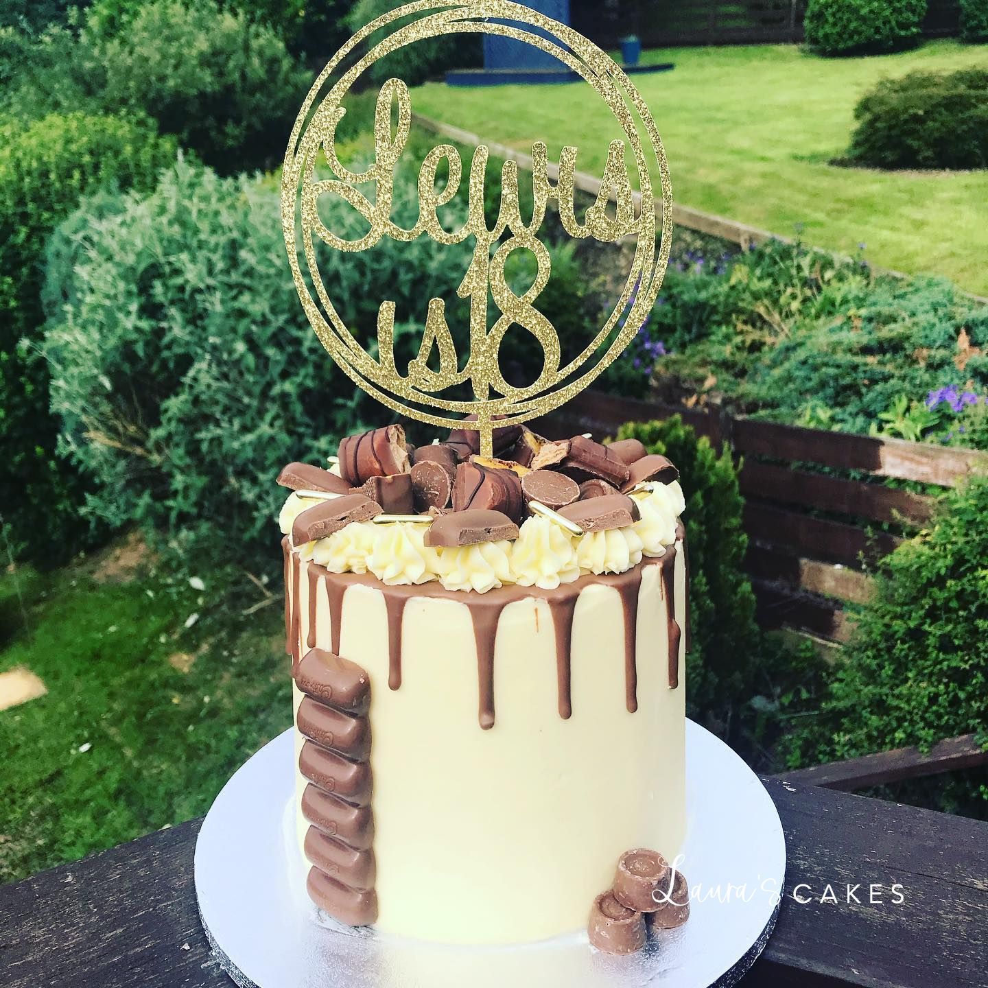 Celebration cake: Chocolate and a gold cake topper