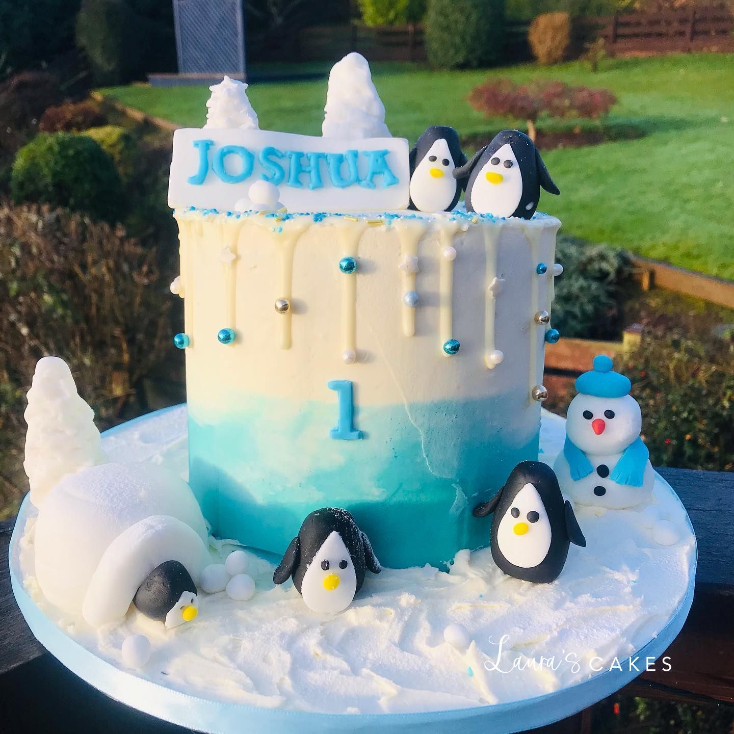 Celebration cake: Penguins and penguins on top