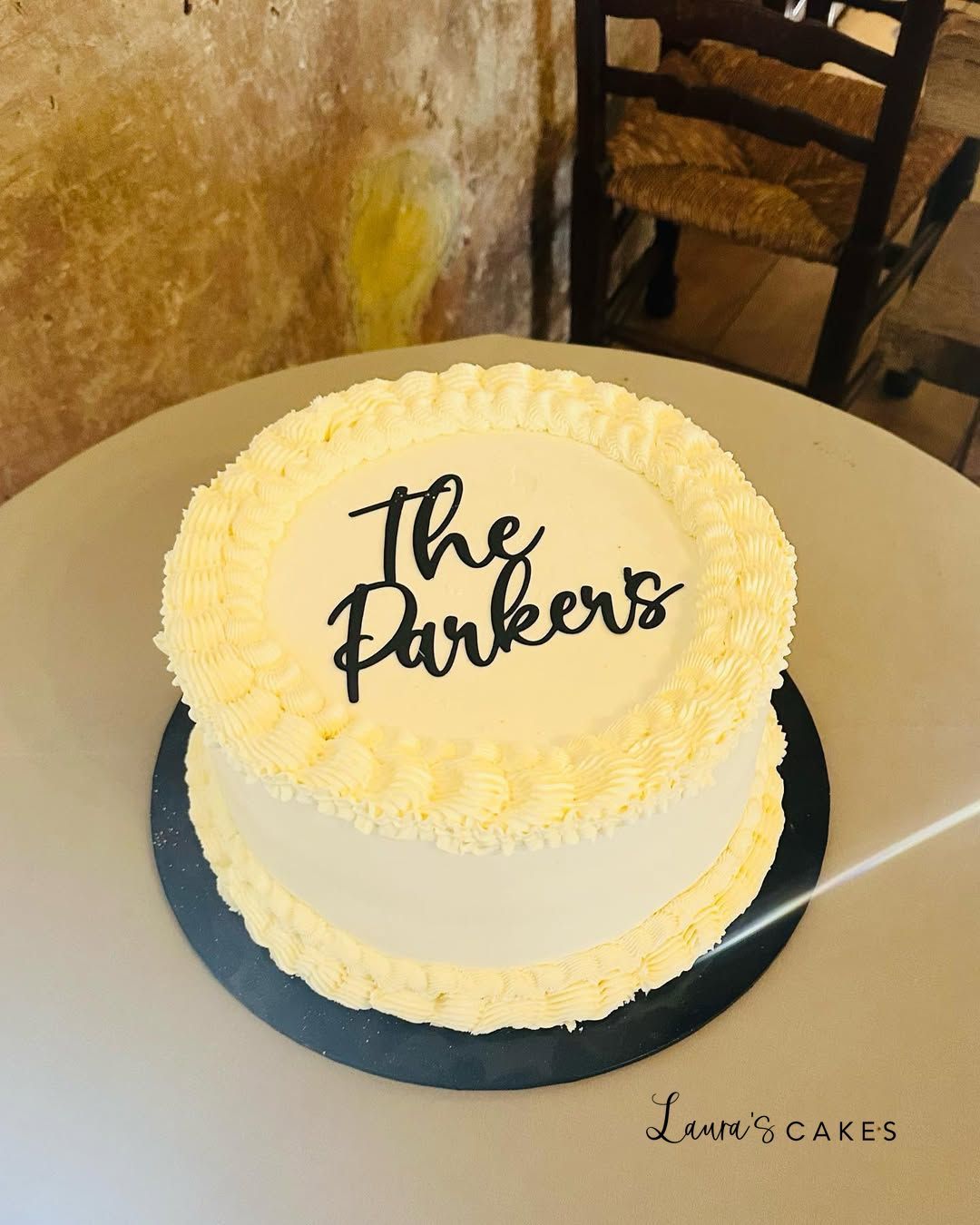 Celebration cake: The word ' the vibe ' on it